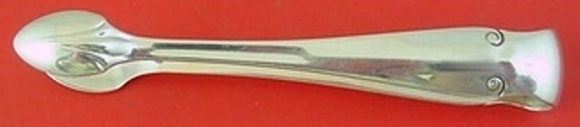 Tiffany & Co. Flemish Sterling Silver Sugar Tong 4 1/8 Inch: Tiffany & Co. Flemish Sterling Silver Sugar Tong 4 1/8 Inch This exquisite sugar tong is crafted from high-quality sterling silver and features the elegant Flemish pattern by Tiffany & Co., a renowned