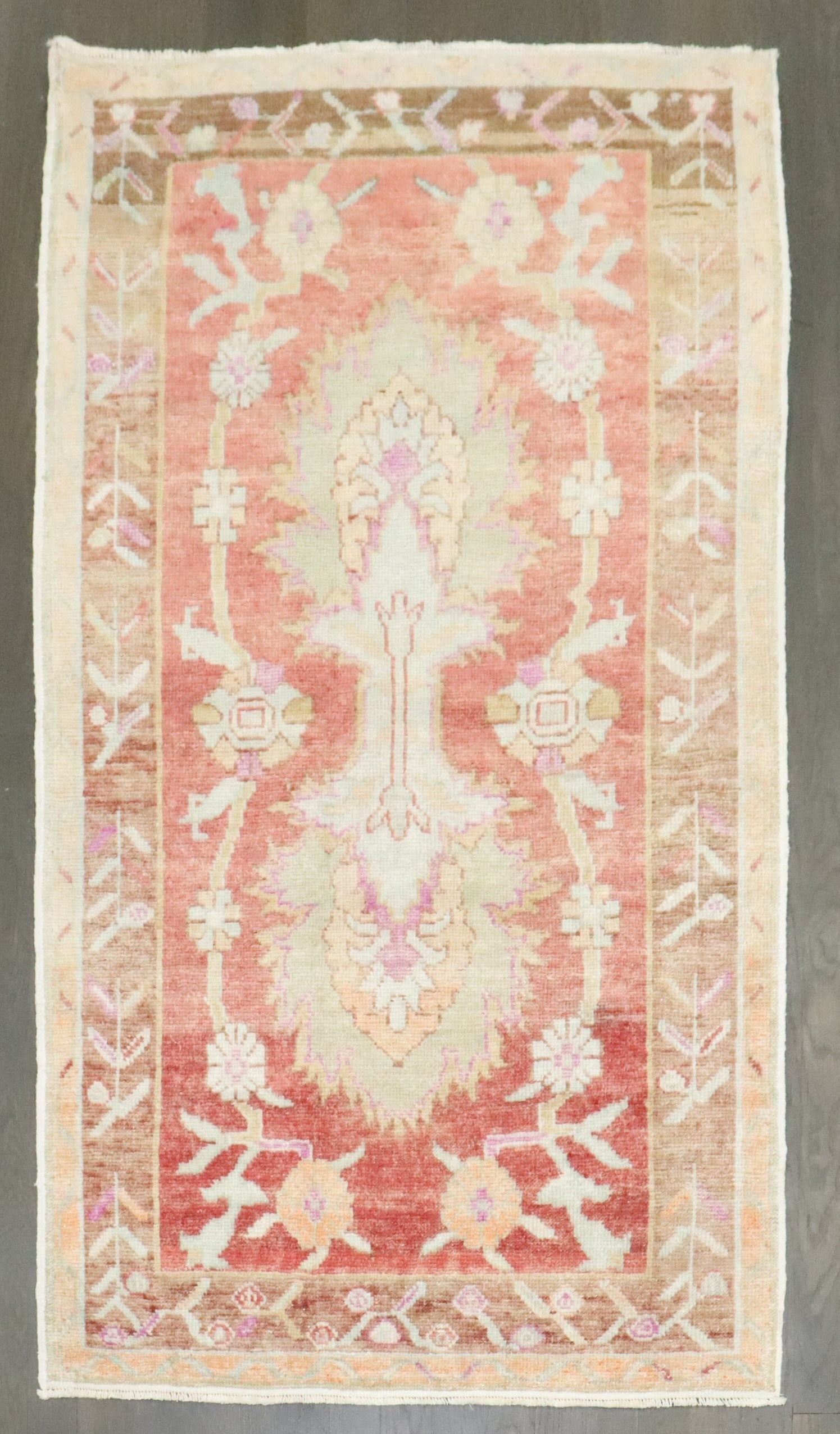 2' 9" x 4' 9" Anatolian Turkish rug in warm red tones: 2' 9" x 4' 9" Anatolian Turkish rug in warm red tones Vintage Turkish Anatolian Oushak rug in soft, warm tones. This mid-20th century piece is a small-format rug with a classic understated look. Pre-o
