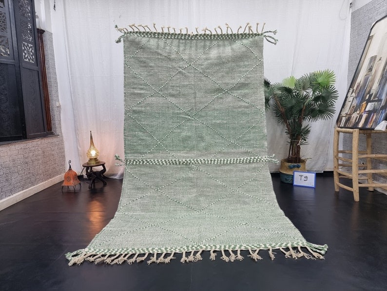 Authentic Handwoven Moroccan Rug 100% Sheep Wool 3.28 x 6.56 ft: Authentic Handwoven Moroccan Rug 100% Sheep Wool 3.28 x 6.56 ft This stunning handwoven rug is crafted by local Berber women weavers in the Atlas Mountains of Morocco. Made from 100% local sheep wool,