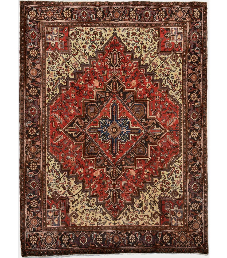 Vintage 7'4 x 9'3 Wool Geometric Serapi Heriz Hand-Knotted Area Rug: Vintage 7'4 x 9'3 Wool Geometric Serapi Heriz Hand-Knotted Area Rug This handmade Serapi Heriz oriental rug features a vintage geometric pattern in shades of red, charcoal, cream, brown, gray, and pal