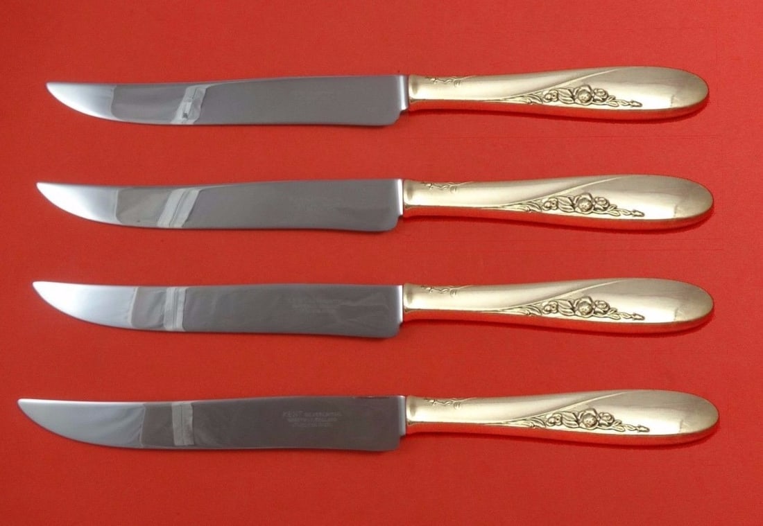 Easterling Rose Spray Sterling Silver Steak Knife Set 4pc Texas Sized: Easterling Rose Spray Sterling Silver Steak Knife Set 4pc Texas Sized Experience the elegance of dining with this exquisite 4-piece Texas-sized steak knife set from Easterling, featuring the beautiful