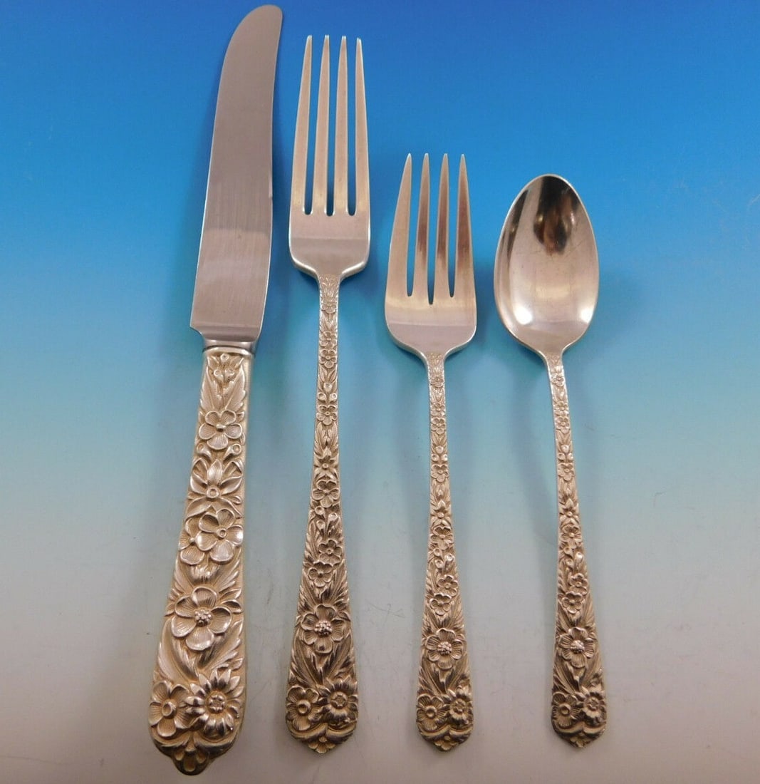 International Sterling Radiant Rose 4-Piece Dinner Place Setting: International Sterling Radiant Rose 4-Piece Dinner Place Setting This exquisite four-piece dinner size place setting features the elegant "Radiant Rose" pattern by International Sterling. Crafted from