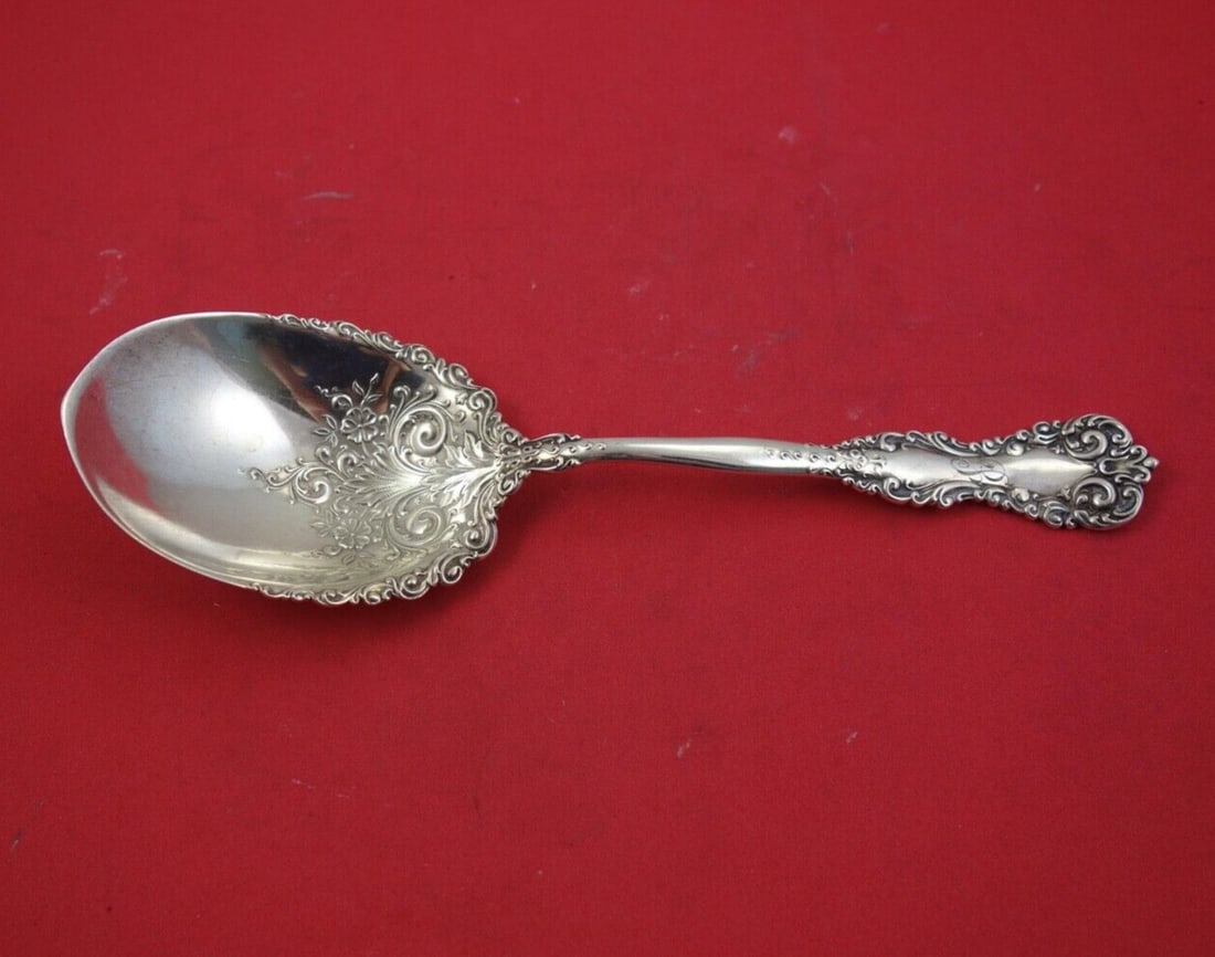 International Silver Revere Sterling Silver Fancy Berry Spoon 8.5 Inch: International Silver Revere Sterling Silver Fancy Berry Spoon 8.5 Inch This is a pre-owned 8.5-inch sterling silver berry spoon from the Revere pattern by International Silver. Crafted in sterling sil