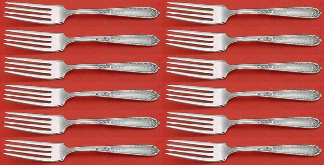 Alvin Della Robbia Sterling Silver Forks Set of 12 7 1/8": Alvin Della Robbia Sterling Silver Forks Set of 12 7 1/8" This elegant set of 12 regular forks showcases the Della Robbia pattern by Alvin, crafted from high-quality sterling silver. Each fork measure