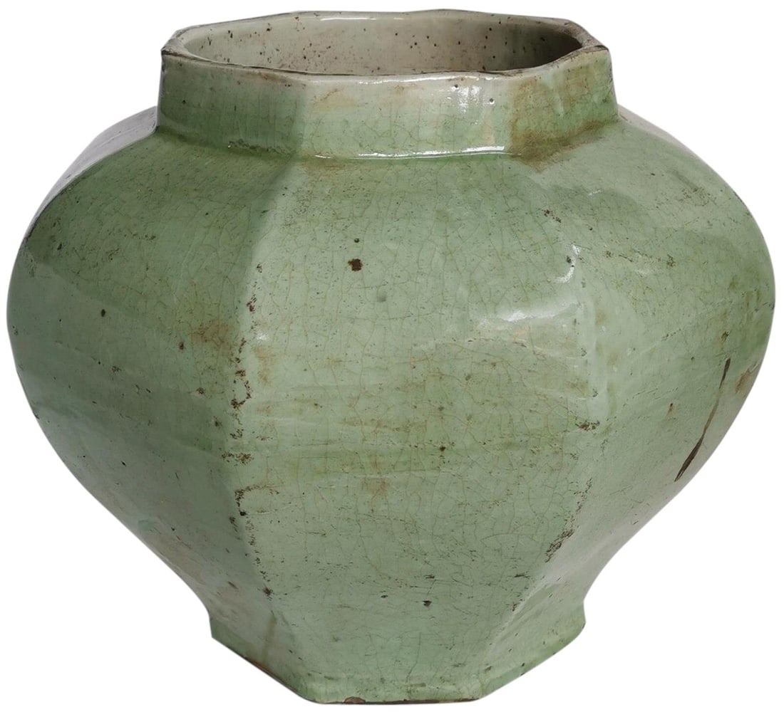 Handmade Celadon Crackle Octagonal Ceramic Decor Jar: Handmade Celadon Crackle Octagonal Ceramic Decor Jar Introducing a stunning Celadon Crackle Octagonal Decor Jar, meticulously handcrafted to reflect vintage charm. This beautiful piece stands at 12 in