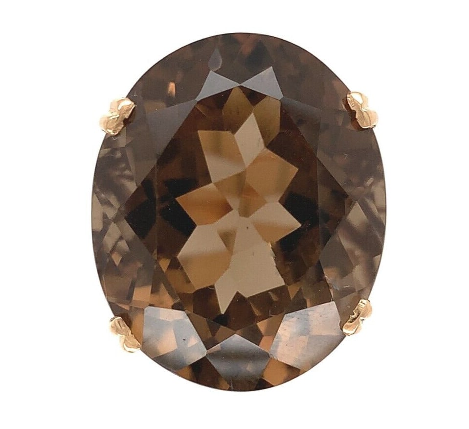 18k Yellow Gold Vintage Ring with Large Oval Smoky Quartz Size 6.75 GIA Certified: 18k Yellow Gold Vintage Ring with Large Oval Smoky Quartz Size 6.75 GIA Certified This stunning 18k yellow gold ring showcases a large, oval, genuine natural smoky quartz, radiating a warm bronze hue.