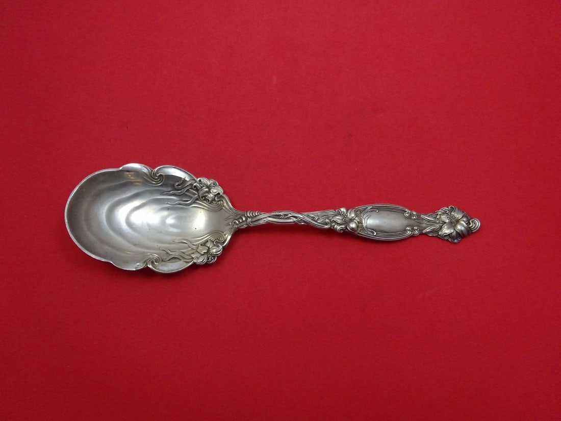 Sterling silver Frontenac berry serving spoon by International 8 3/4 inch: Sterling silver Frontenac berry serving spoon by International 8 3/4 inch This is a sterling silver berry serving spoon in the Frontenac pattern by International. The spoon features a narrow design wi