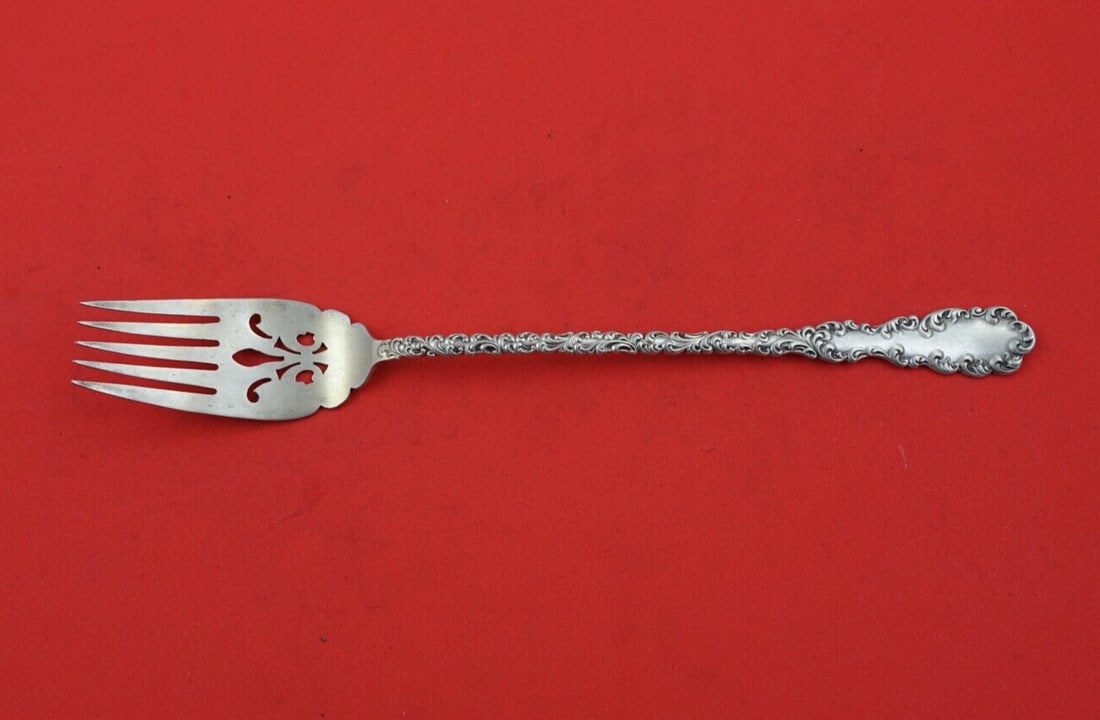 Wallace Waverly Sterling Silver 9 Inch Salad Serving Fork: Wallace Waverly Sterling Silver 9 Inch Salad Serving Fork This exquisite Waverly by Wallace salad serving fork is crafted from high-quality sterling silver. Featuring a long and pierced design, this 9