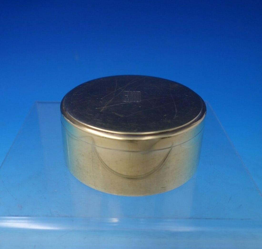 Tiffany & Co Sterling Silver Vermeil Tobacco Tin Monogrammed #7396: Tiffany & Co Sterling Silver Vermeil Tobacco Tin Monogrammed #7396 This exquisite tobacco tin from Tiffany & Co. is crafted from sterling silver and features a beautiful vermeil finish, which is a com