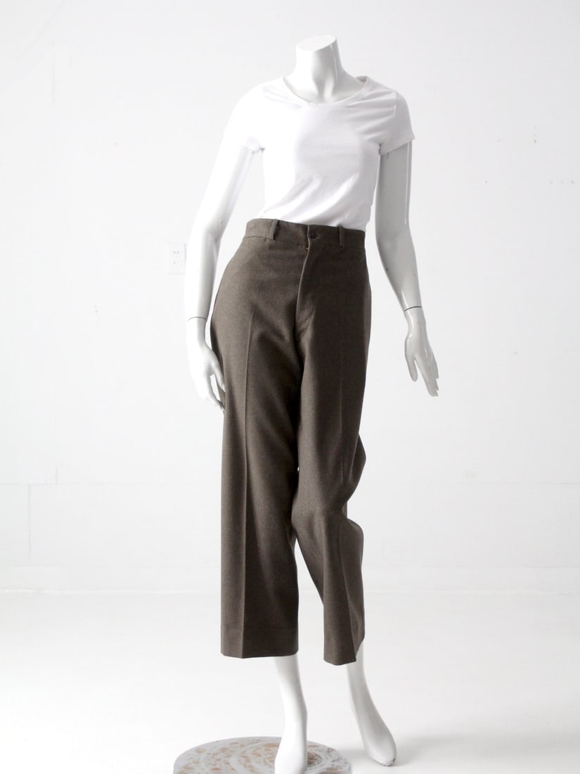 1950s Vintage Olive Brown Wool US Army Pants Classic Style: 1950s Vintage Olive Brown Wool US Army Pants Classic Style Discover a piece of history with these vintage American Army pants from the 1950s. Crafted from olive brown wool, these trousers showcase a c