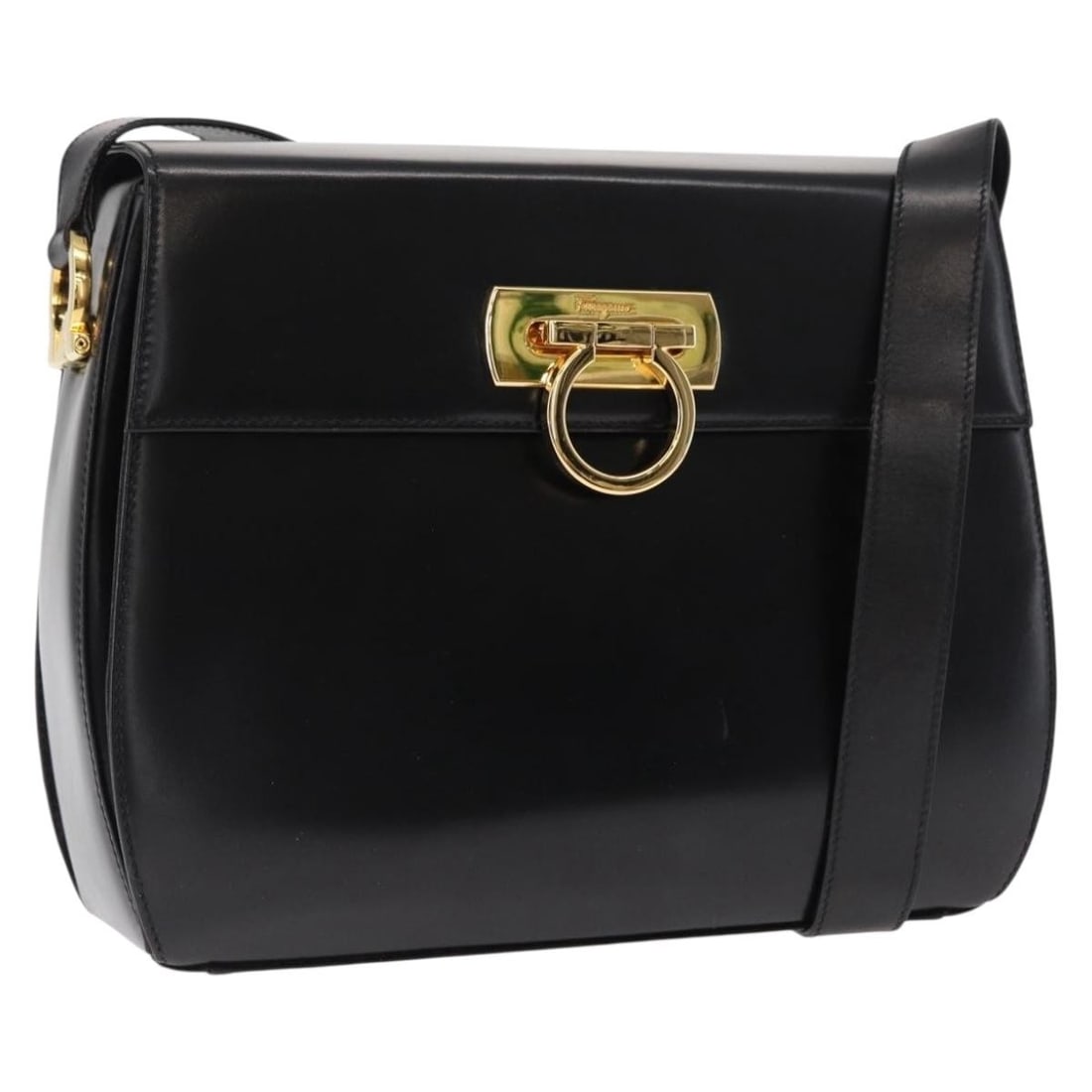 Black Leather Shoulder Bag Salvatore Ferragamo Gancini Italy: Black Leather Shoulder Bag Salvatore Ferragamo Gancini Italy Salvatore Ferragamo Gancini shoulder bag in black and gold leather, made in Italy. This women's bag comes with a dust bag and features a co