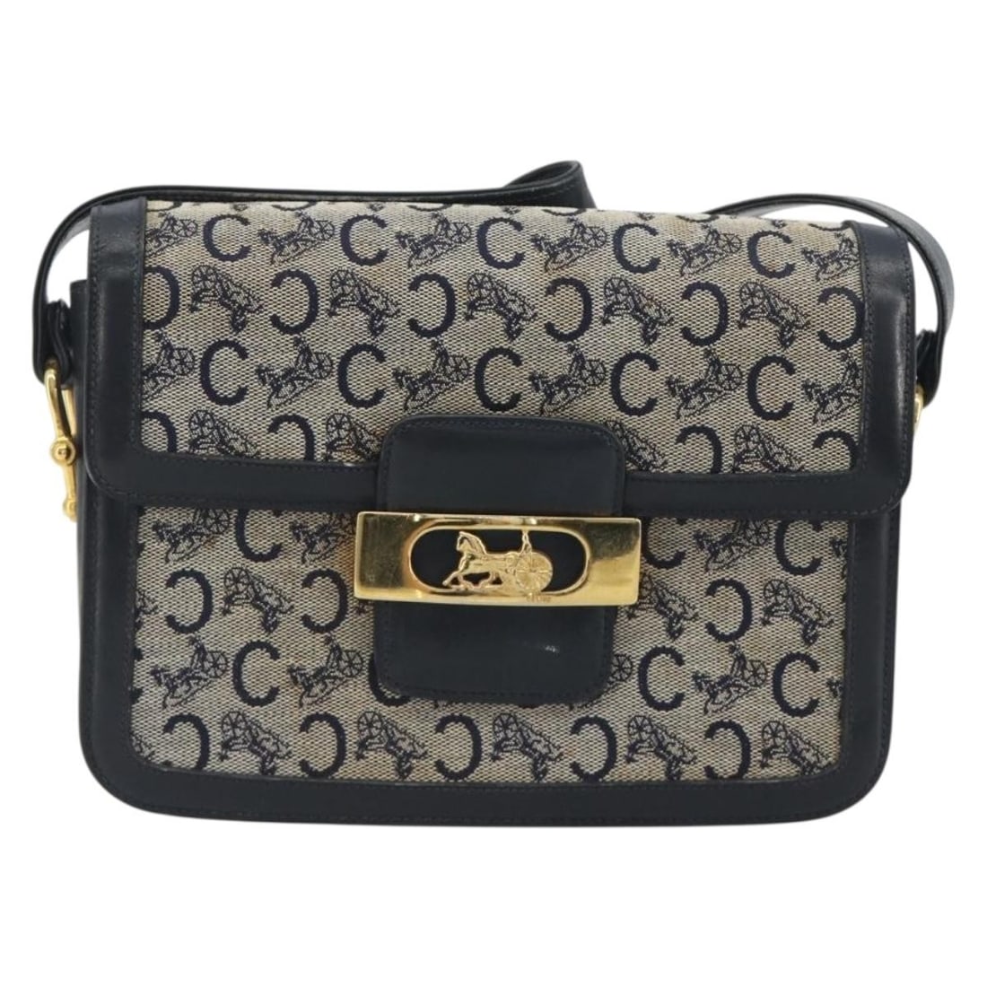 Celine Vintage Horse Carriage C Macadam Canvas Shoulder Bag: Celine Vintage Horse Carriage C Macadam Canvas Shoulder Bag Vintage Celine Horse Carriage C Macadam bag crafted in canvas with a navy finish. This pre-owned piece is in good condition with visible sig
