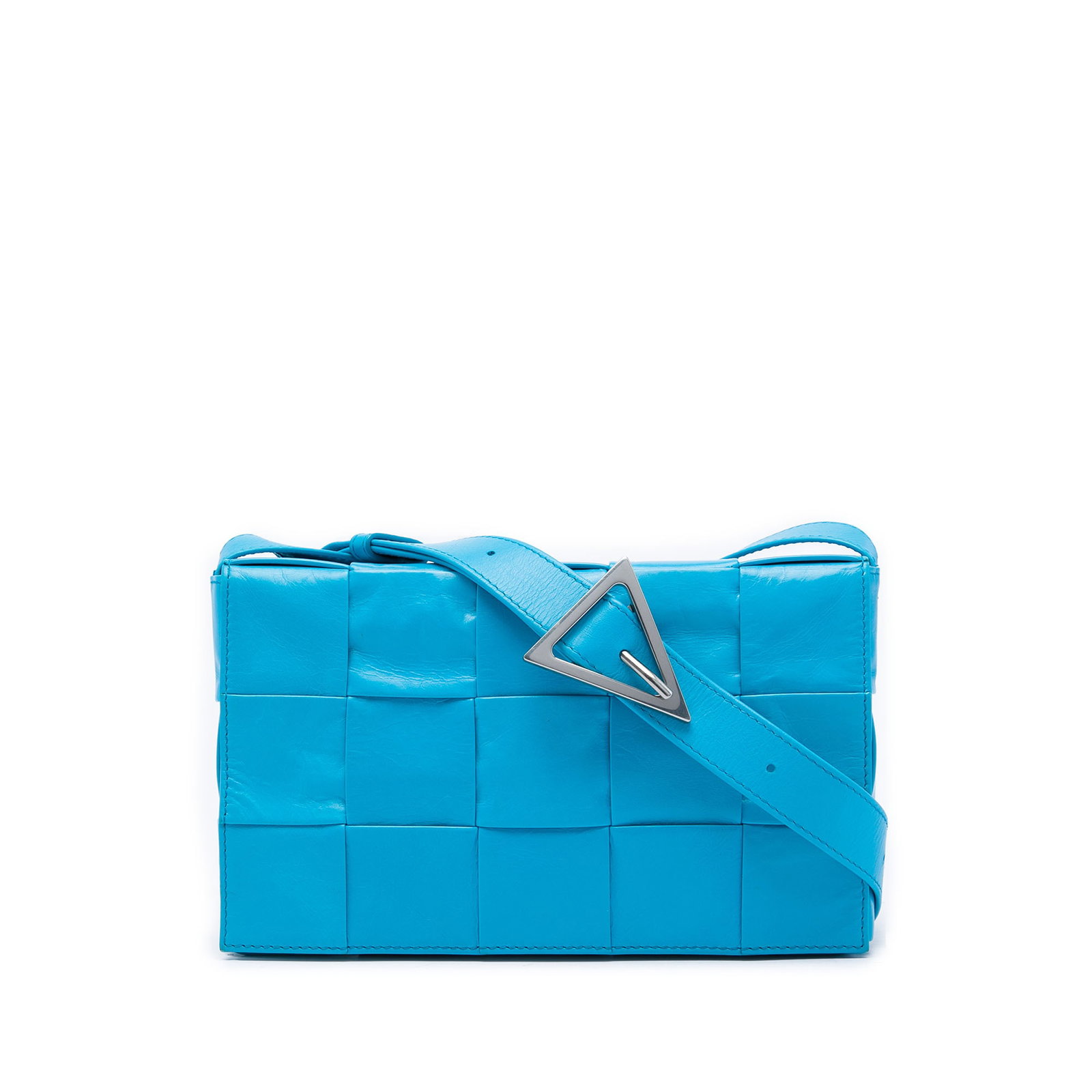 Bottega Veneta Cassette Intrecciato blue leather crossbody bag: Bottega Veneta Cassette Intrecciato blue leather crossbody bag This Bottega Veneta Cassette crossbody is crafted in blue paper calfskin with the signature Intrecciato woven leather design. It features
