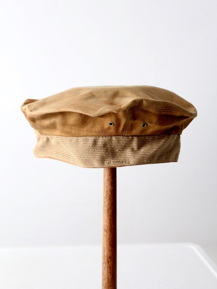 Vintage U.S. Army Cap Circa 1948 Khaki Twill Canvas: Vintage U.S. Army Cap Circa 1948 Khaki Twill Canvas This vintage U.S. Army service hat, dating back to circa 1948, features a classic khaki twill canvas design. The cap includes a wide band and gromme
