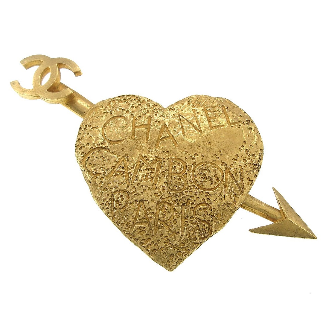 CHANEL Heart Arrow Brooch Gold Plated Bow Motif 93A: CHANEL Heart Arrow Brooch Gold Plated Bow Motif 93A Gold-plated Chanel brooch in a heart motif with arrow design, made in France. The piece is described as being in very good condition and measures ap