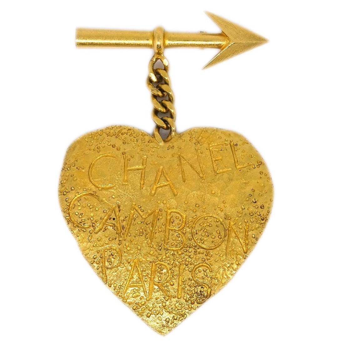 CHANEL 93A Gold Plated Bow Arrow Heart Brooch: CHANEL 93A Gold Plated Bow Arrow Heart Brooch Chanel bow and arrow heart brooch pin in gold-plated metal. This brooch features a heart motif with arrow design and comes with its box. Condition shows s