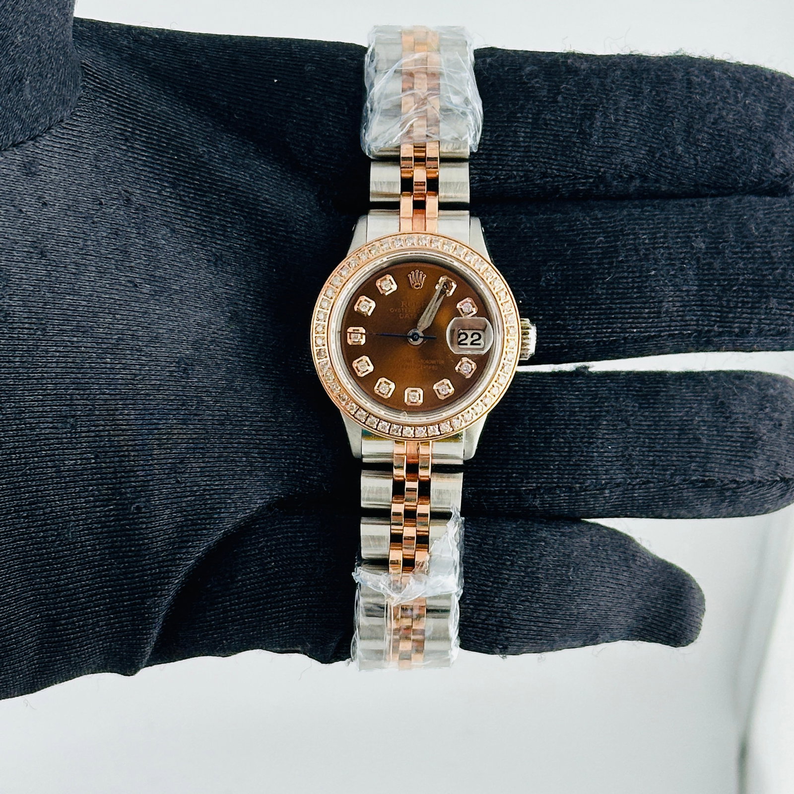 Rolex Datejust Ladies Watch Ref. 6619 with aftermarket Jubilee bracelet: Rolex Datejust Ladies Watch Ref. 6619 with aftermarket Jubilee bracelet Ladies Rolex Datejust with reference number 6619. The watch features an Aftermarket chocolate diamond dial, a pave plated diamon