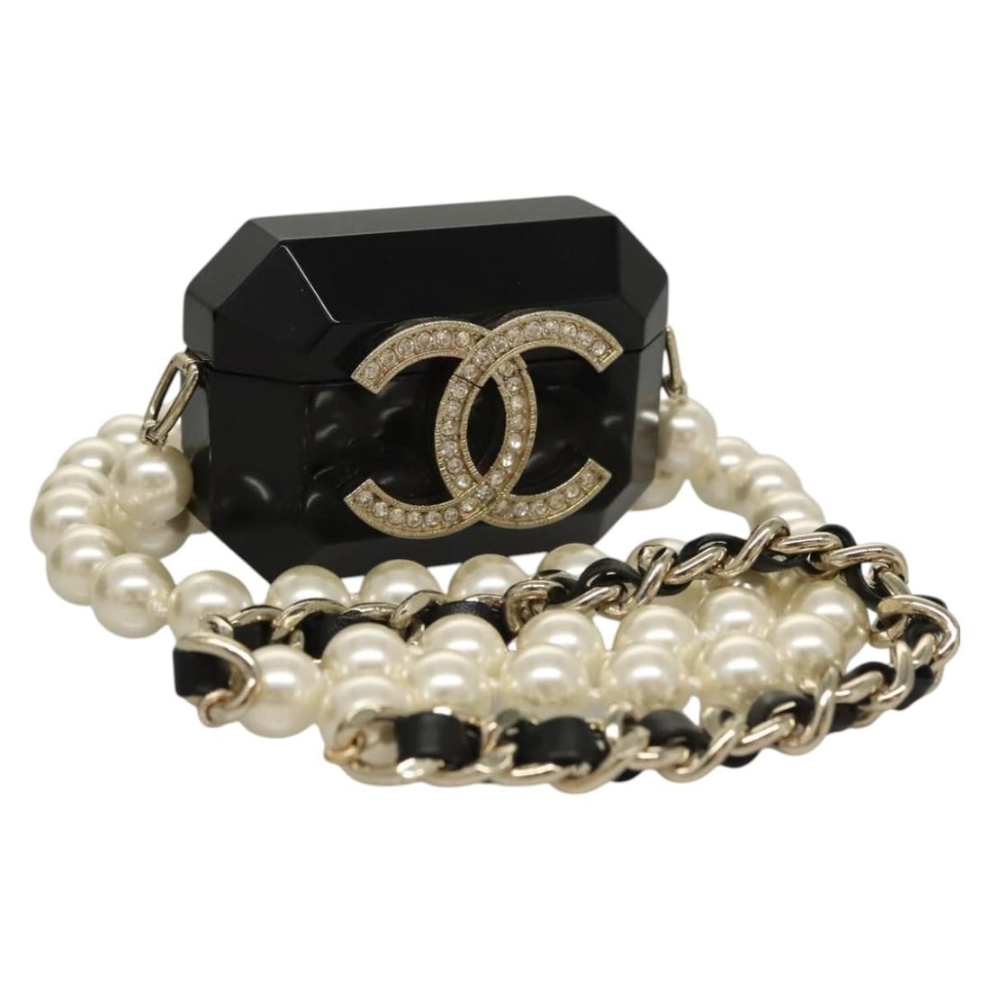 CHANEL CC Black Plastic AirPods Shoulder Bag with Box: CHANEL CC Black Plastic AirPods Shoulder Bag with Box Black CHANEL AirPods case in plastic with a CC design and shoulder strap. Made in Italy, this women's shoulder bag-style case includes the item bo