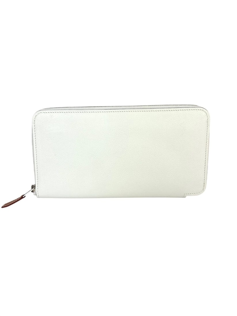HERMES Silk'In Classique Long Zip Around Wallet White Leather Silk: HERMES Silk'In Classique Long Zip Around Wallet White Leather Silk Hermes Evercolor Silk'In Classique long wallet in white, designed in a small size with a zip-around style. It is made from leather si