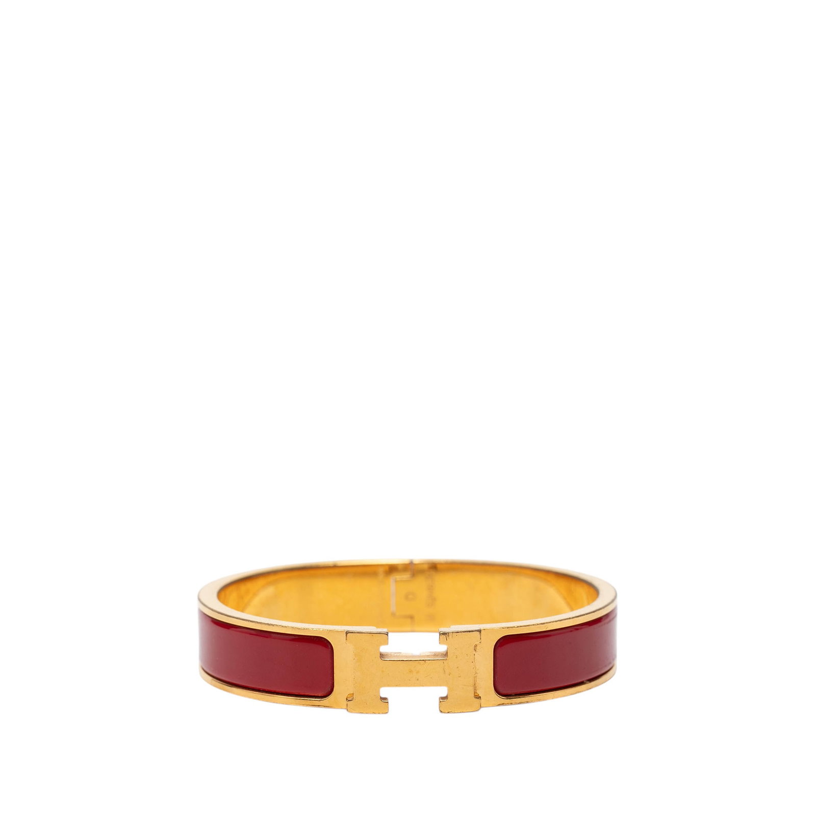 Hermes Clic H PM narrow enamel bracelet red gold plated: Hermes Clic H PM narrow enamel bracelet red gold plated Hermes Narrow Enamel Clic H Bracelet PM in red, featuring an enamel and gold-plated metal body with a metal clasp closure. It is a costume piece