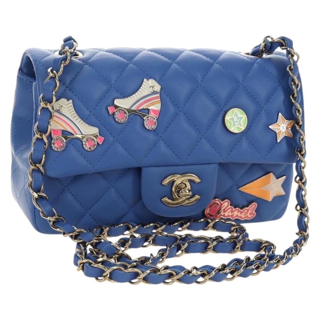 CHANEL Mini Matelasse Lamb Skin Shoulder Bag Blue Gold CC: CHANEL Mini Matelasse Lamb Skin Shoulder Bag Blue Gold CC A CHANEL Mini Matelasse 20 chain shoulder bag in lamb skin with a blue and gold color combination. This women's shoulder bag is made in Italy 