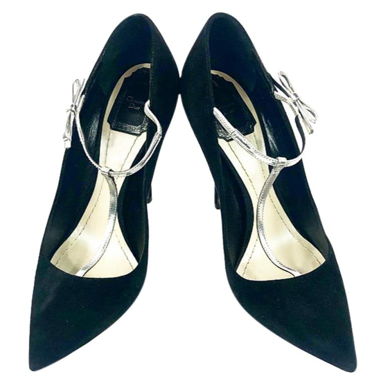 Christian Dior Coquette black suede pumps silver bow size 38: Christian Dior Coquette black suede pumps silver bow size 38 Christian Dior Coquette pumps in black suede with a silver metallic leather stretchable strap and bow detail at the sides. These point-toe 