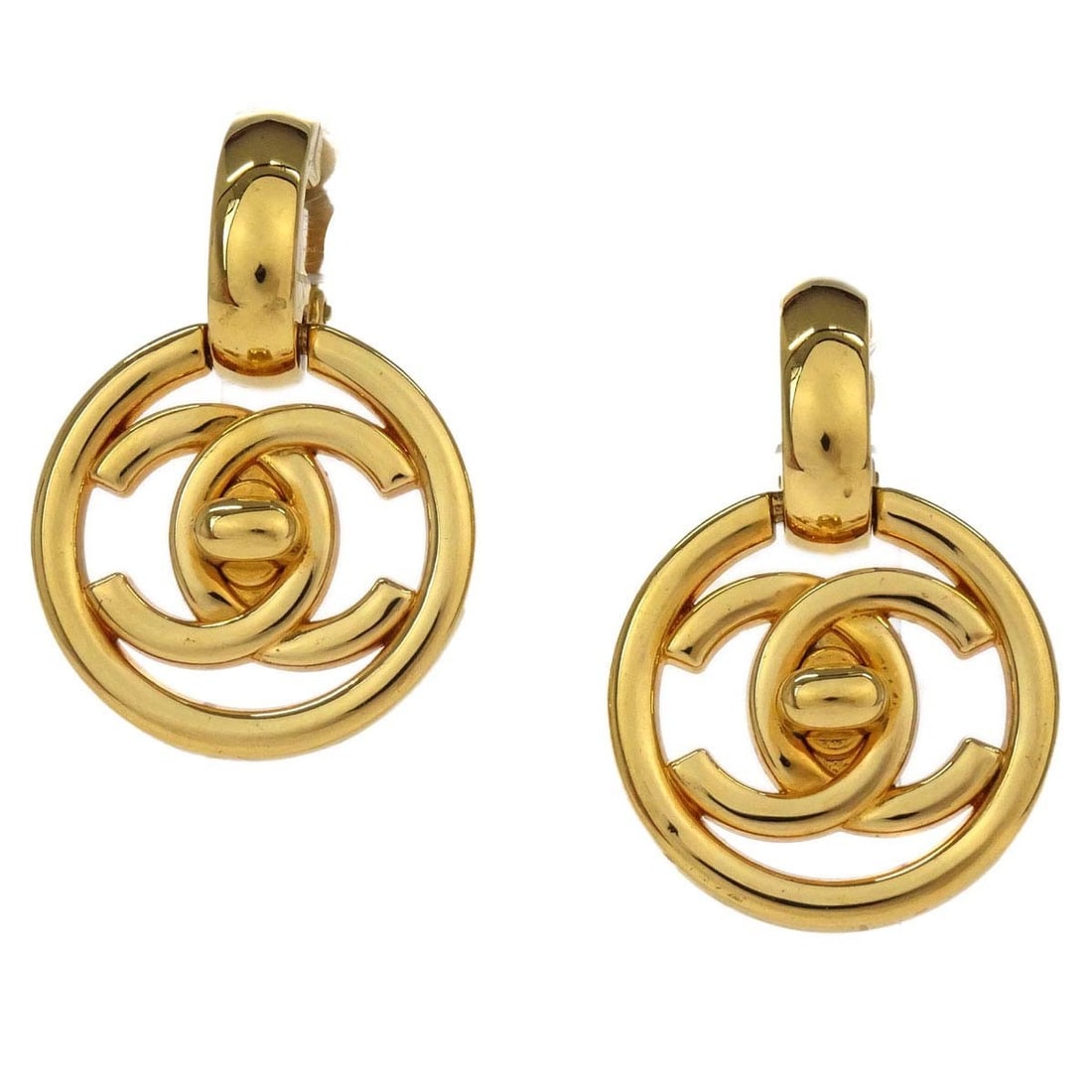 CHANEL 97P Gold Plated Clip On Dangle Earrings: CHANEL 97P Gold Plated Clip On Dangle Earrings Chanel dangle clip-on earrings featuring a round button-style top with turnlock design details in a gold-plated finish. Made in France, this pair is in v