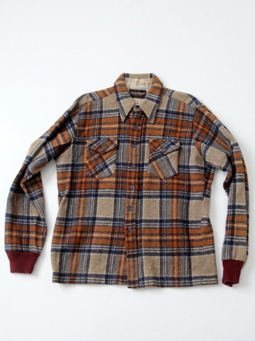 1970s The King Size Co Woolly Plaid Shirt Jacket XXL: 1970s The King Size Co Woolly Plaid Shirt Jacket XXL Step back into the 1970s with this vintage plaid flannel shirt jacket from The King Size Co. Crafted from a warm blend of 70% wool and 30% nylon, t