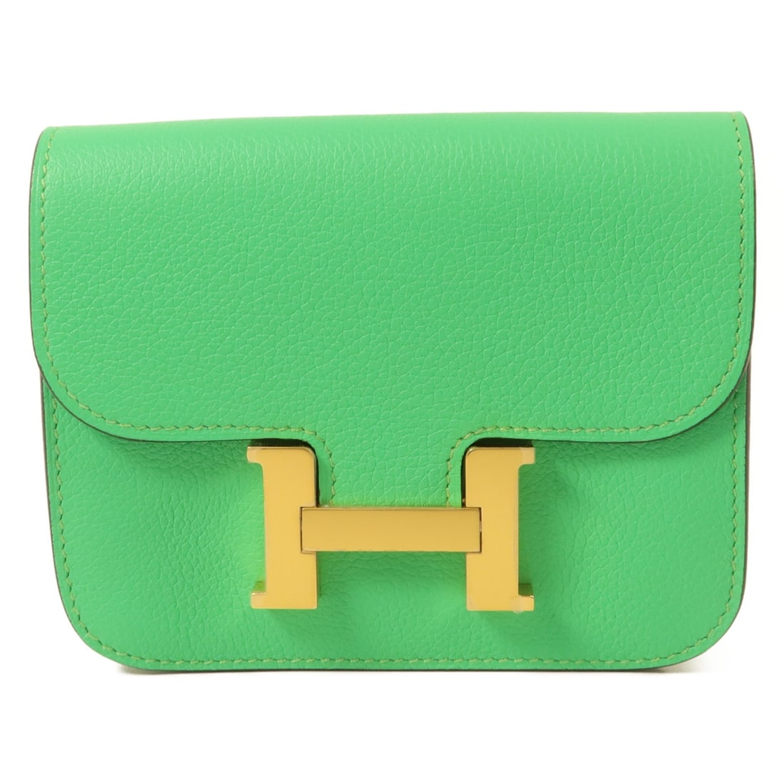 HERMES Constance Slim bifold wallet Evercolor calfskin Vert Comics Bleu Zellige: HERMES Constance Slim bifold wallet Evercolor calfskin Vert Comics Bleu Zellige Slim bi-fold wallet in Evercolor leather and calfskin with a flap closure. Made in France, this women's wallet is presen