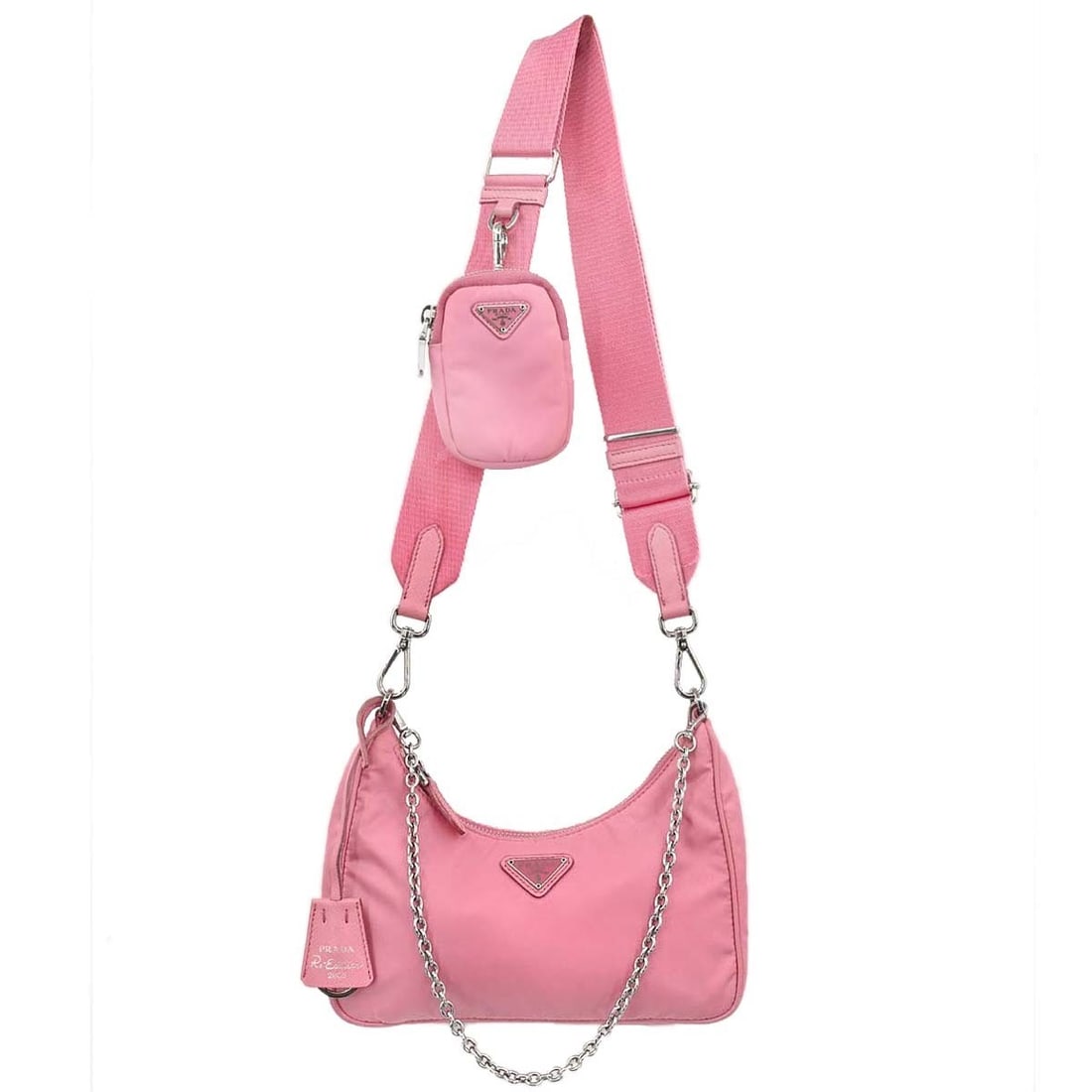 PRADA Re-Edition 2005 Mini Pink Nylon 2way Top Handle Bag: PRADA Re-Edition 2005 Mini Pink Nylon 2way Top Handle Bag This Prada Re-Edition 2005 2way handbag is crafted in pink nylon and styled as a mini top handle bag. It features a matching pink lining and w
