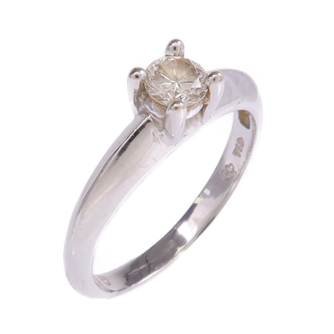 18K White Gold Diamond Ring Size 5 by JEWELRY: 18K White Gold Diamond Ring Size 5 by JEWELRY Women's ring in K18 white gold with diamond. The ring is size 5 and features a clear diamond accent. It has a reasonable wear and tear condition and comes