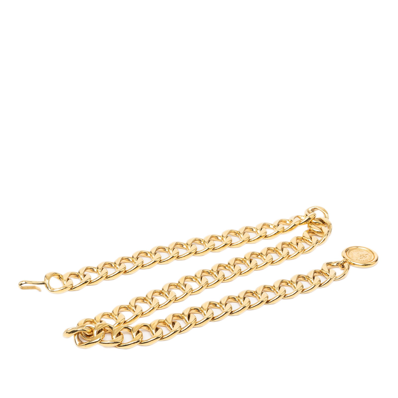 Chanel CC Medallion Gold Plated Chain Belt: Chanel CC Medallion Gold Plated Chain Belt Chanel chain belt featuring a gold plated metal body with a CC medallion charm and hook closure. Made in France. Condition is B+ with discoloration and scrat