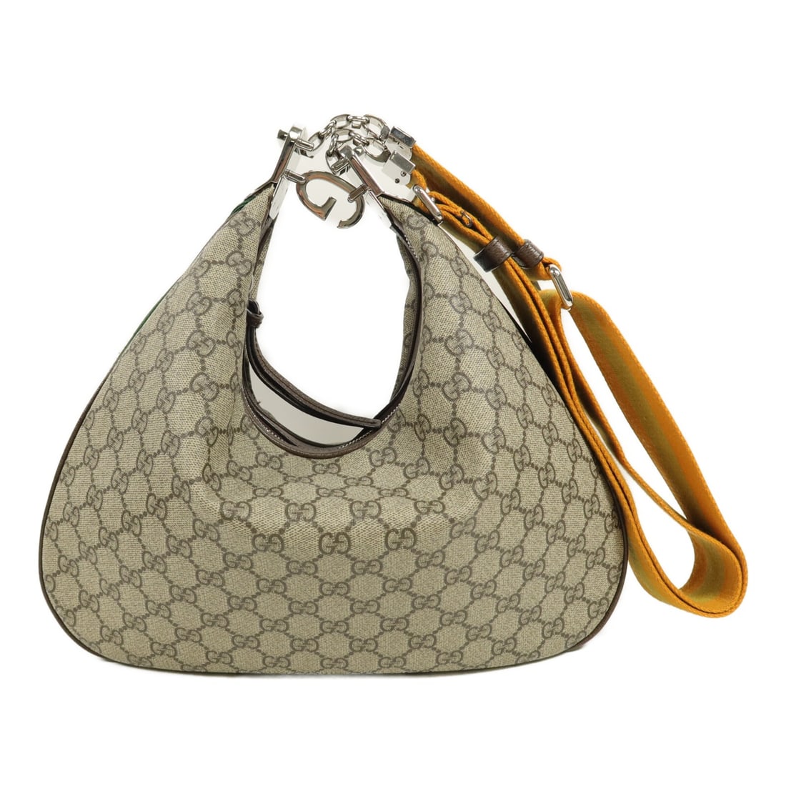 Gucci 702823 GG Attache Brown Coated Canvas Shoulder Bag: Gucci 702823 GG Attache Brown Coated Canvas Shoulder Bag Gucci GG Attache shoulder bag in brown GG coated canvas with a shoulder carry design and interior zip pocket. Made in Italy, this women's bag i