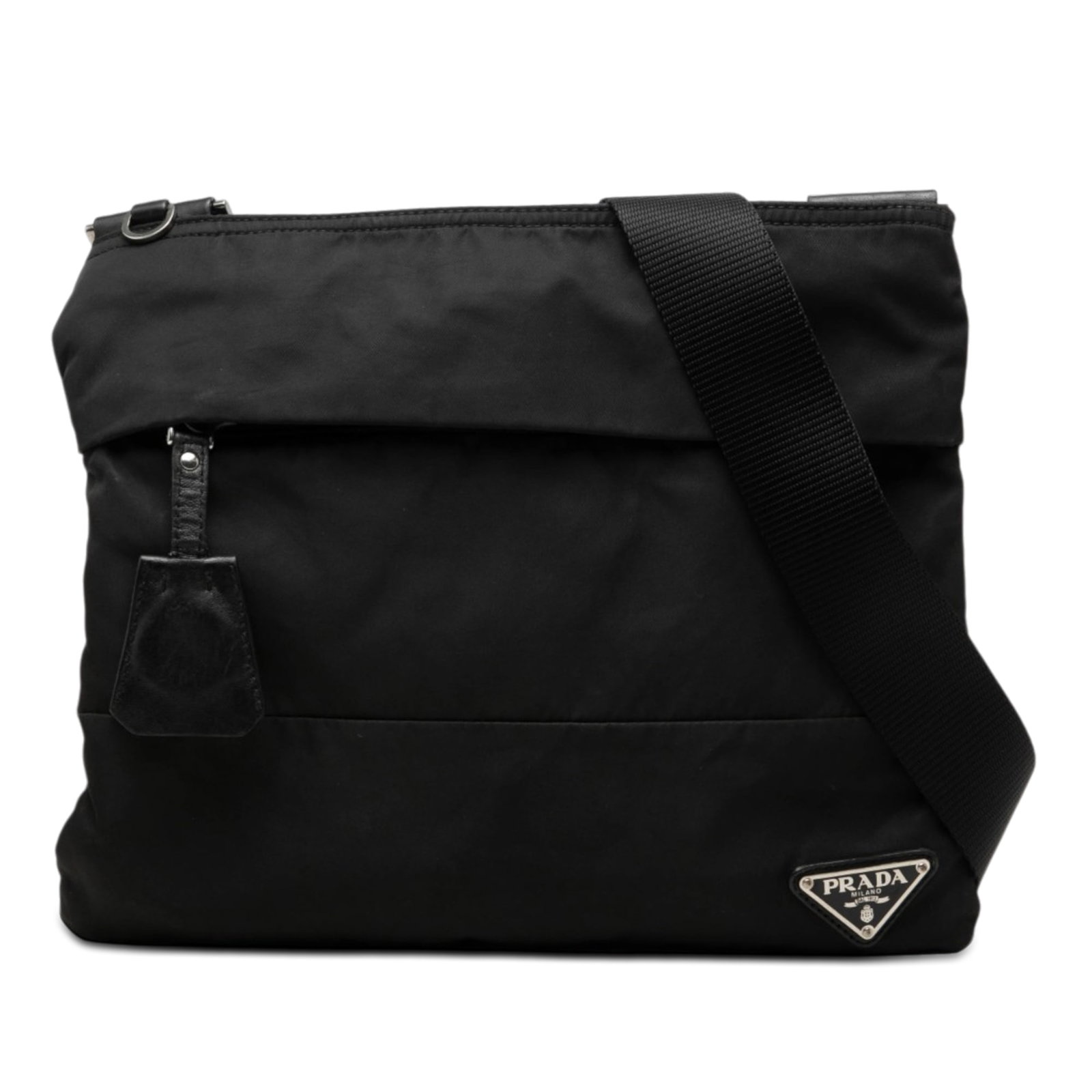 Prada Tessuto black nylon crossbody bag with zip top: Prada Tessuto black nylon crossbody bag with zip top Prada Tessuto Zip Top Crossbody in black fabric with a zip-top closure, front exterior zip pocket, and interior zip pocket. This crossbody bag has 