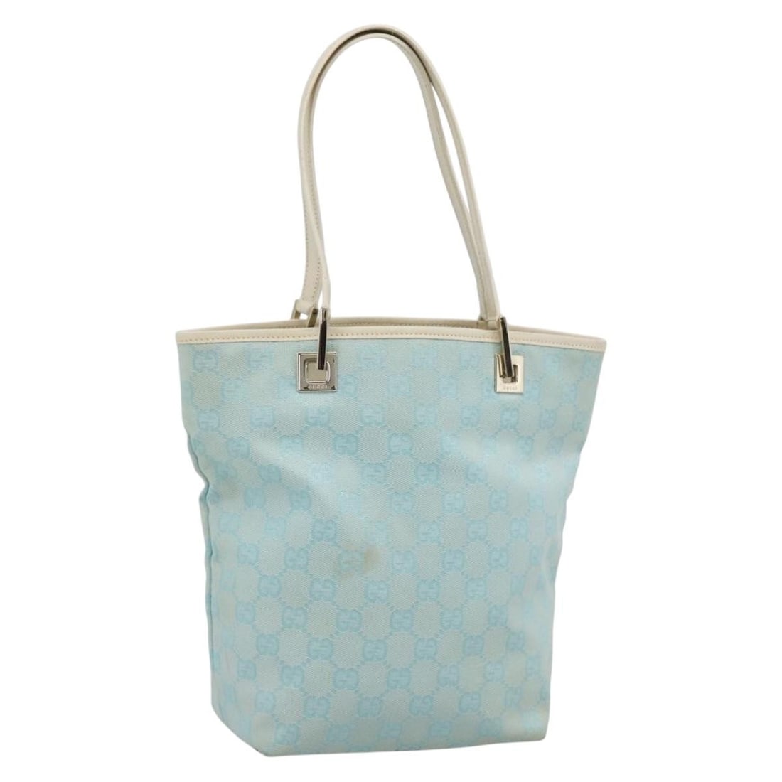Gucci 002 1099 2404 GG Canvas Tote Light Blue Gold: Gucci 002 1099 2404 GG Canvas Tote Light Blue Gold A Gucci tote bag in GG Canvas with a light blue and gold color combination. Made in Italy, it comes with a dust bag and has a ranked condition of B, 