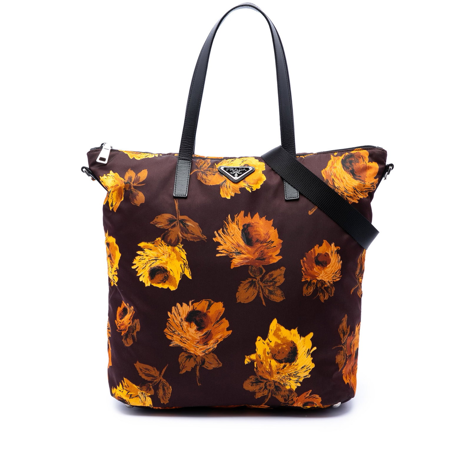 Prada Tessuto Stampato Nylon Satchel with Leather Handles: Prada Tessuto Stampato Nylon Satchel with Leather Handles Prada Tessuto Stampato Satchel in brown, featuring a printed nylon body with flat leather handles and a detachable, adjustable flat strap. It 