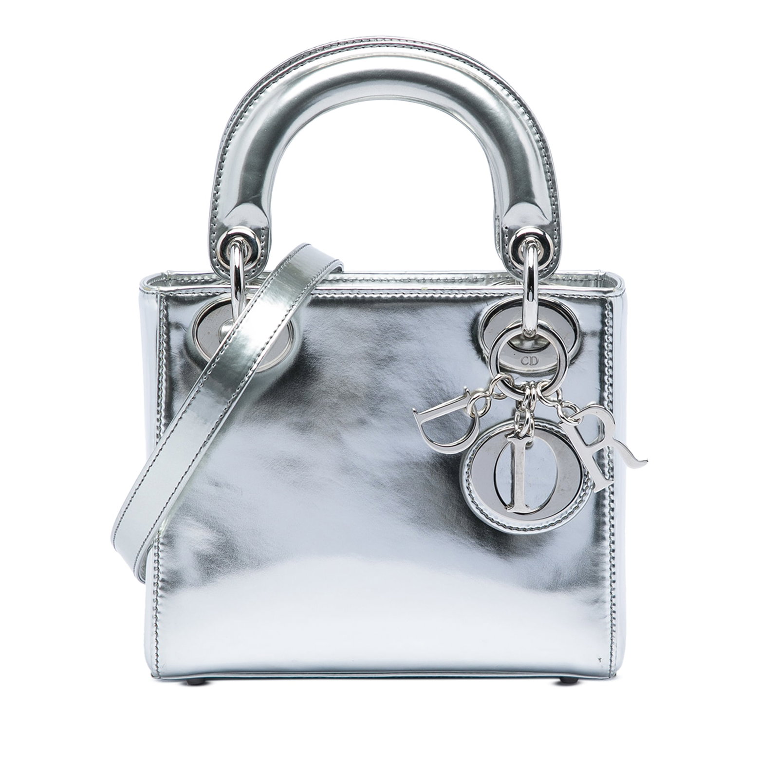 Dior Lady Dior Mini handbag in metallic silver patent leather: Dior Lady Dior Mini handbag in metallic silver patent leather A compact Lady Dior handbag crafted in metallic patent leather with rolled leather handles and a detachable flat leather strap. The bag fe