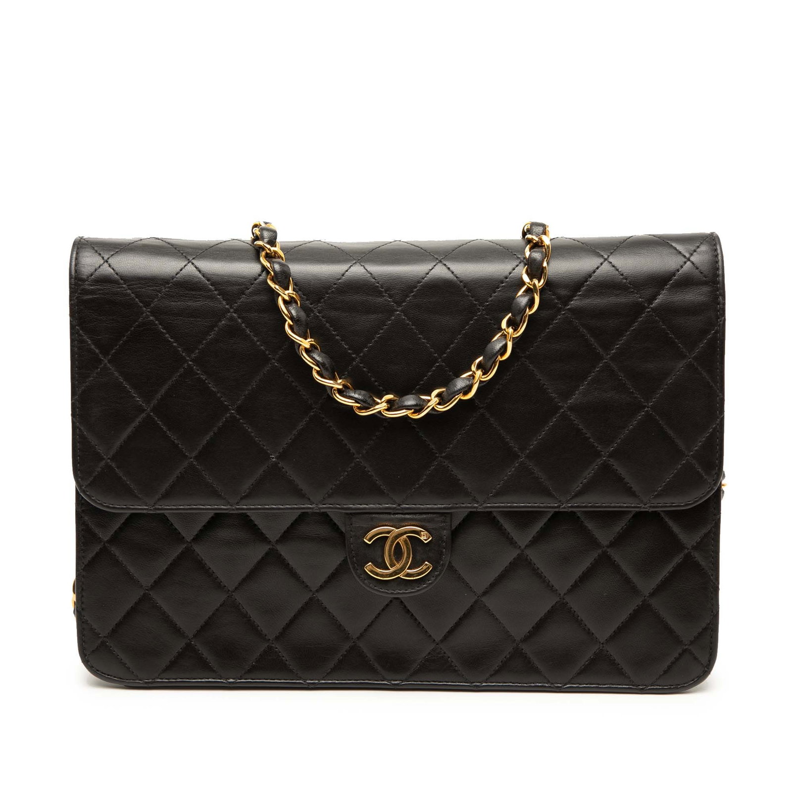 Chanel black lambskin quilted crossbody flap bag: Chanel black lambskin quilted crossbody flap bag This Chanel Medium CC Quilted Lambskin Single Flap crossbody bag is crafted from black quilted lambskin leather and features a leather-woven chain stra