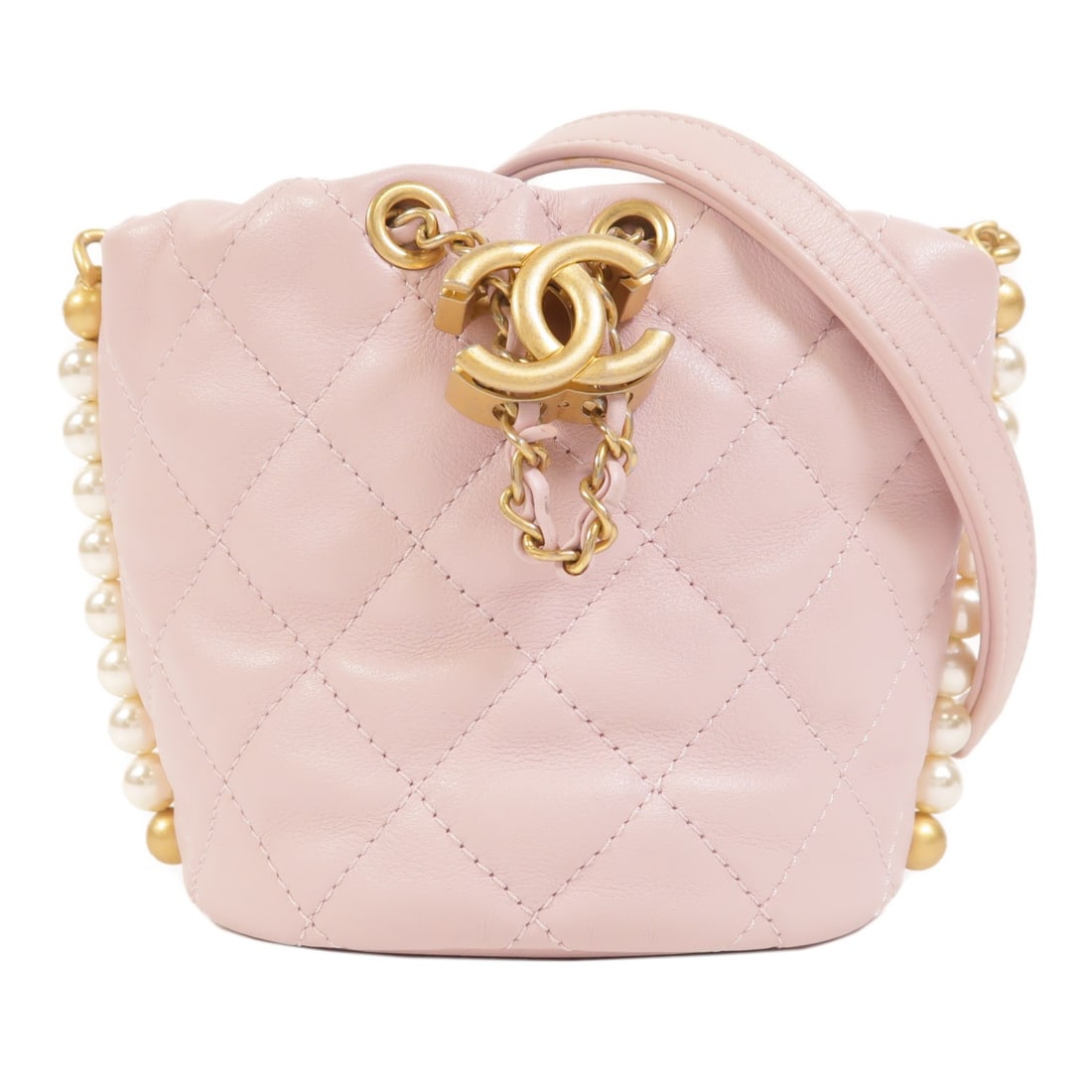 Chanel Mini About Pearls Drawstring Shoulder Bag Pink Lambskin GHW: Chanel Mini About Pearls Drawstring Shoulder Bag Pink Lambskin GHW A CHANEL mini shoulder bag in pink lambskin (sheep leather) with a drawstring design and CC hardware in gold-tone hardware. The bag i