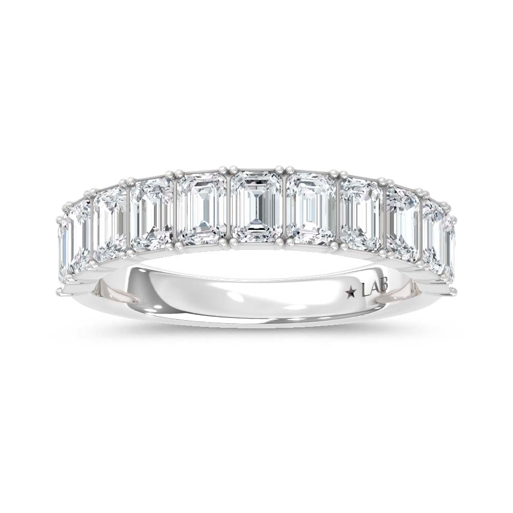 14K White Gold Lab Grown Diamond Emerald Cut Shape 1 1/3 Ct.Tw. Half Way Band: 14K White Gold Lab Grown Diamond Emerald Cut Shape 1 1/3 Ct.Tw. Half Way Band This stunning 14K White Gold Band features 1 1/3 Ct.Tw. of Emerald Cut Lab Grown Diamonds. The elegant emerald cuts, known