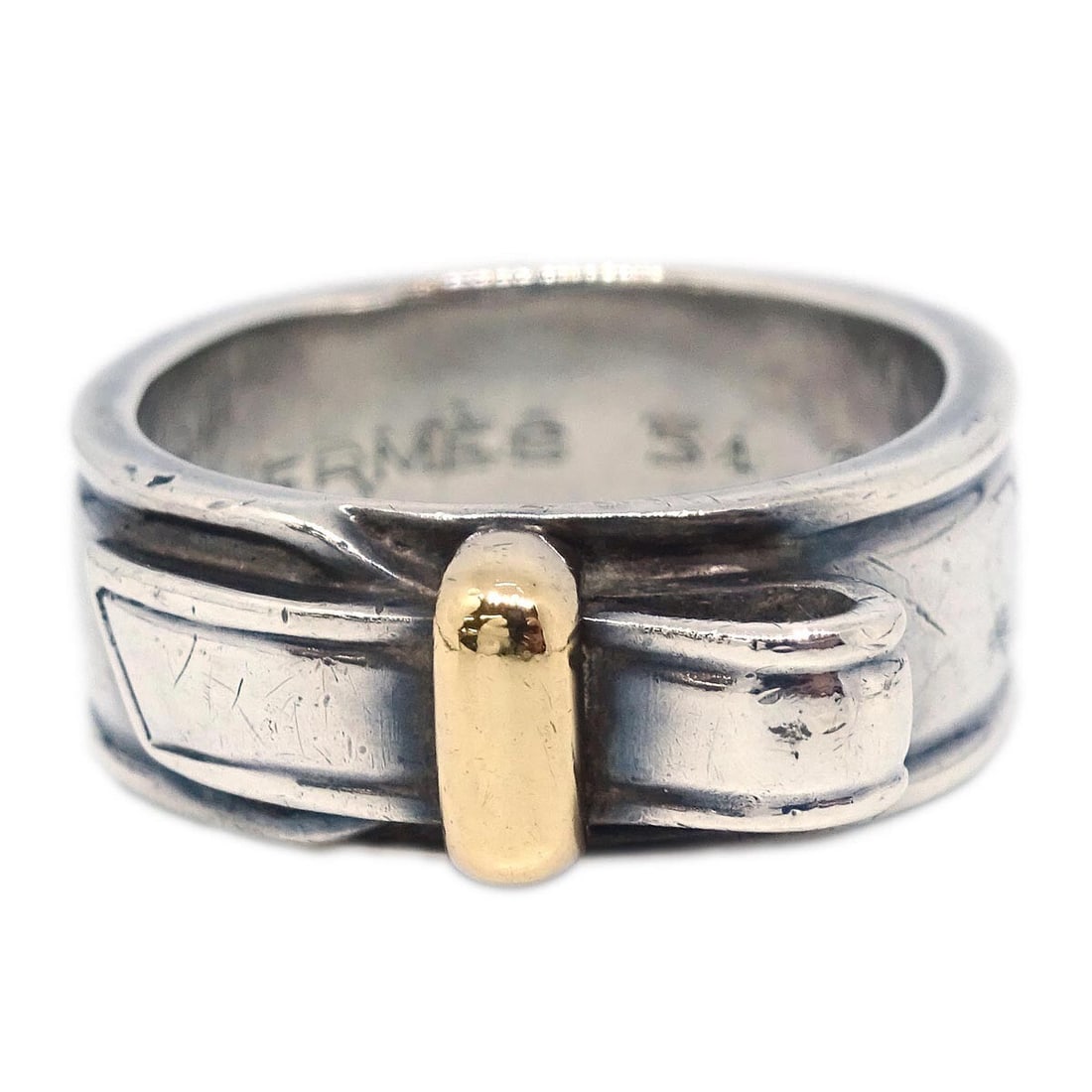 HERMES Sterling Silver Round Ring Size 49 Vintage: HERMES Sterling Silver Round Ring Size 49 Vintage Vintage Hermes round ring in sterling silver with 18K yellow gold accents. This ring shows reasonable wear from use, including scratches, dirt, and de