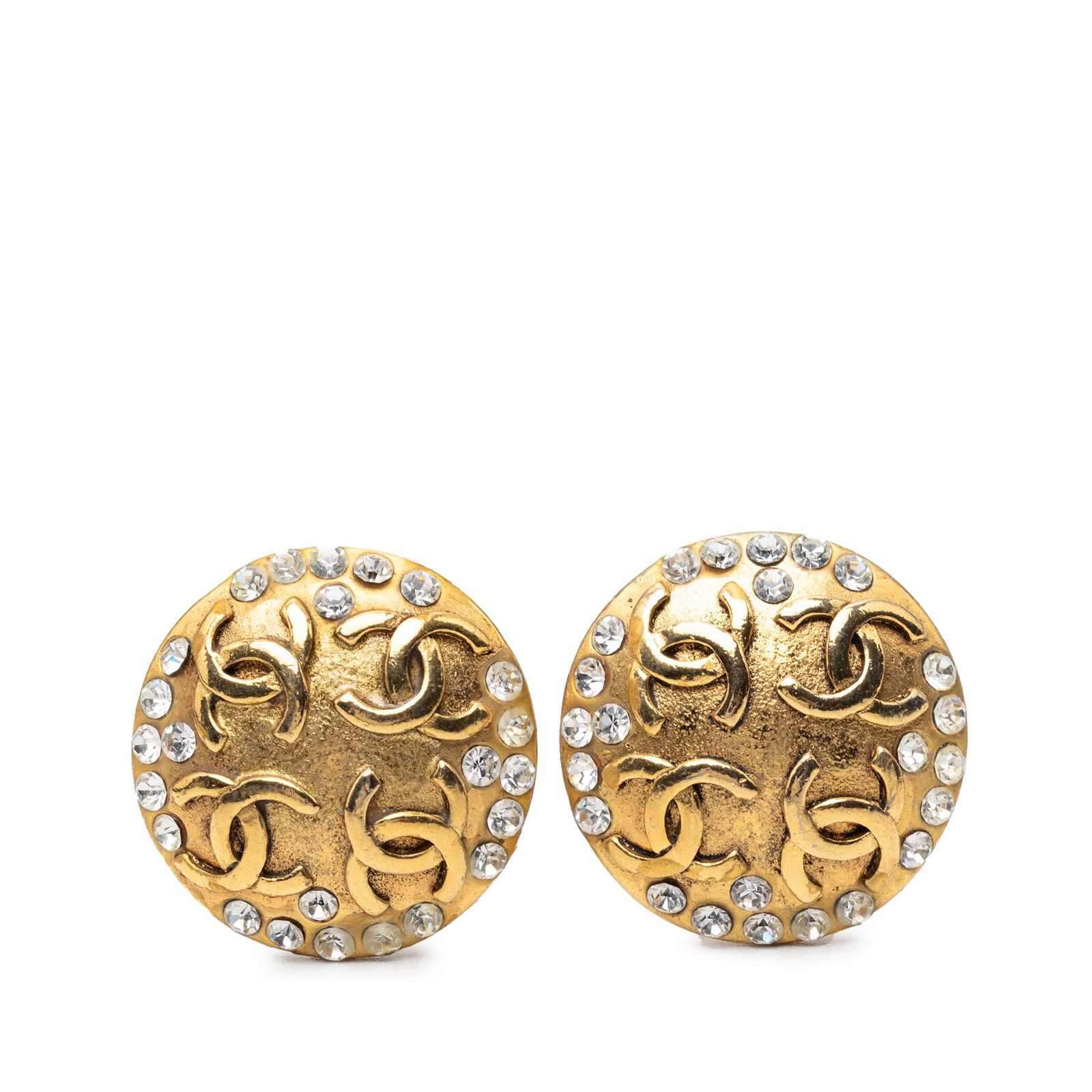 Chanel CC Round Clip On Earrings Gold Plated Strass: Chanel CC Round Clip On Earrings Gold Plated Strass Round Chanel CC clip-on earrings in gold plated metal with strass crystal detailing. This costume jewelry pair is made in France and features clip-o