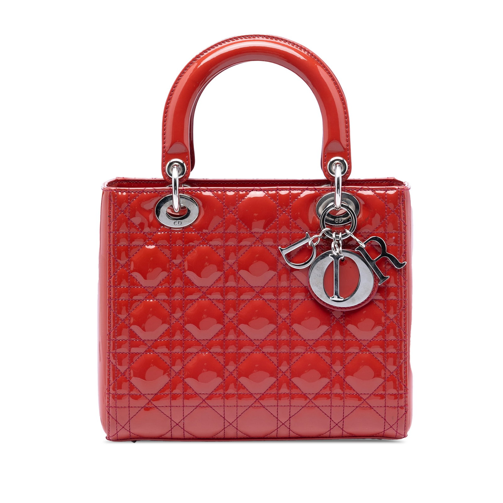 Dior Medium Patent Cannage Lady Bag Red Leather: Dior Medium Patent Cannage Lady Bag Red Leather This Medium Patent Cannage Lady Dior bag showcases a red patent leather body with the iconic cannage stitching, flat leather top handles, a secure top z