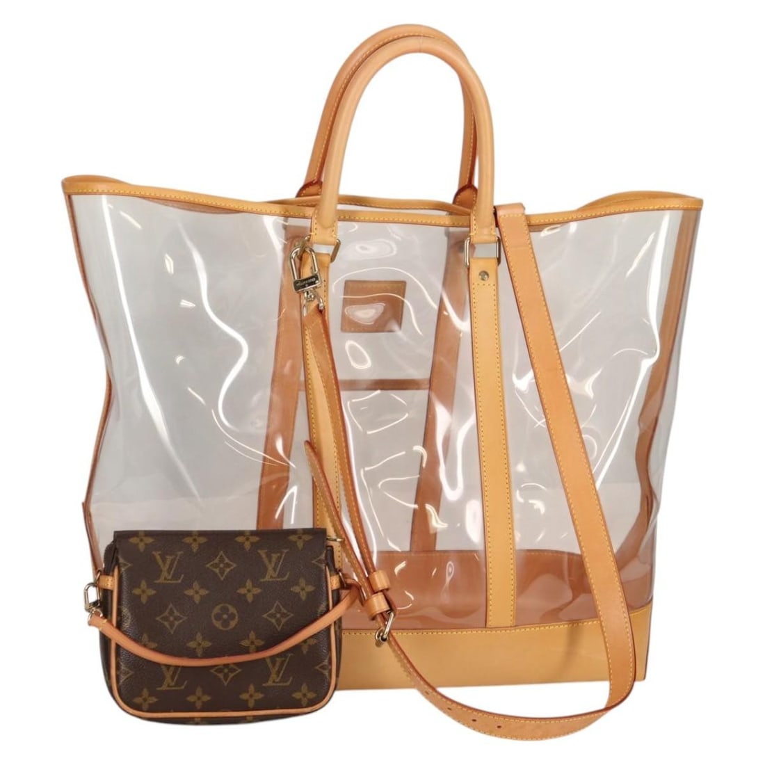 Louis Vuitton M99027 Isaac Mizrahi clear vinyl tote bag: Louis Vuitton M99027 Isaac Mizrahi clear vinyl tote bag Louis Vuitton Isaac Mizrahi tote bag in clear and beige vinyl with leather trim. This women's tote includes a dust bag, shoulder strap, and pouc