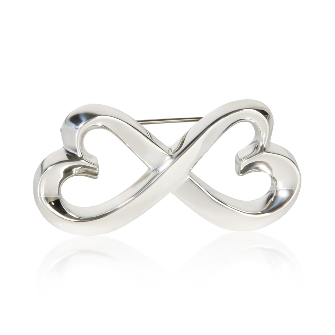 Tiffany & Co. Paloma Picasso Loving Heart Sterling Silver Brooch: Tiffany & Co. Paloma Picasso Loving Heart Sterling Silver Brooch Pre-owned Tiffany & Co. Paloma Picasso Loving Heart brooch in sterling silver. This unisex brooch from the Paloma Picasso Loving Heart 