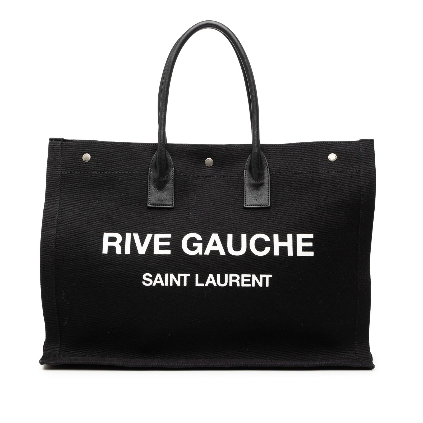 Saint Laurent Rive Gauche Black Canvas Tote Bag with Leather Handles: Saint Laurent Rive Gauche Black Canvas Tote Bag with Leather Handles This Saint Laurent Canvas Rive Gauche Tote features a canvas body with rolled leather handles, an open top secured by a snap button