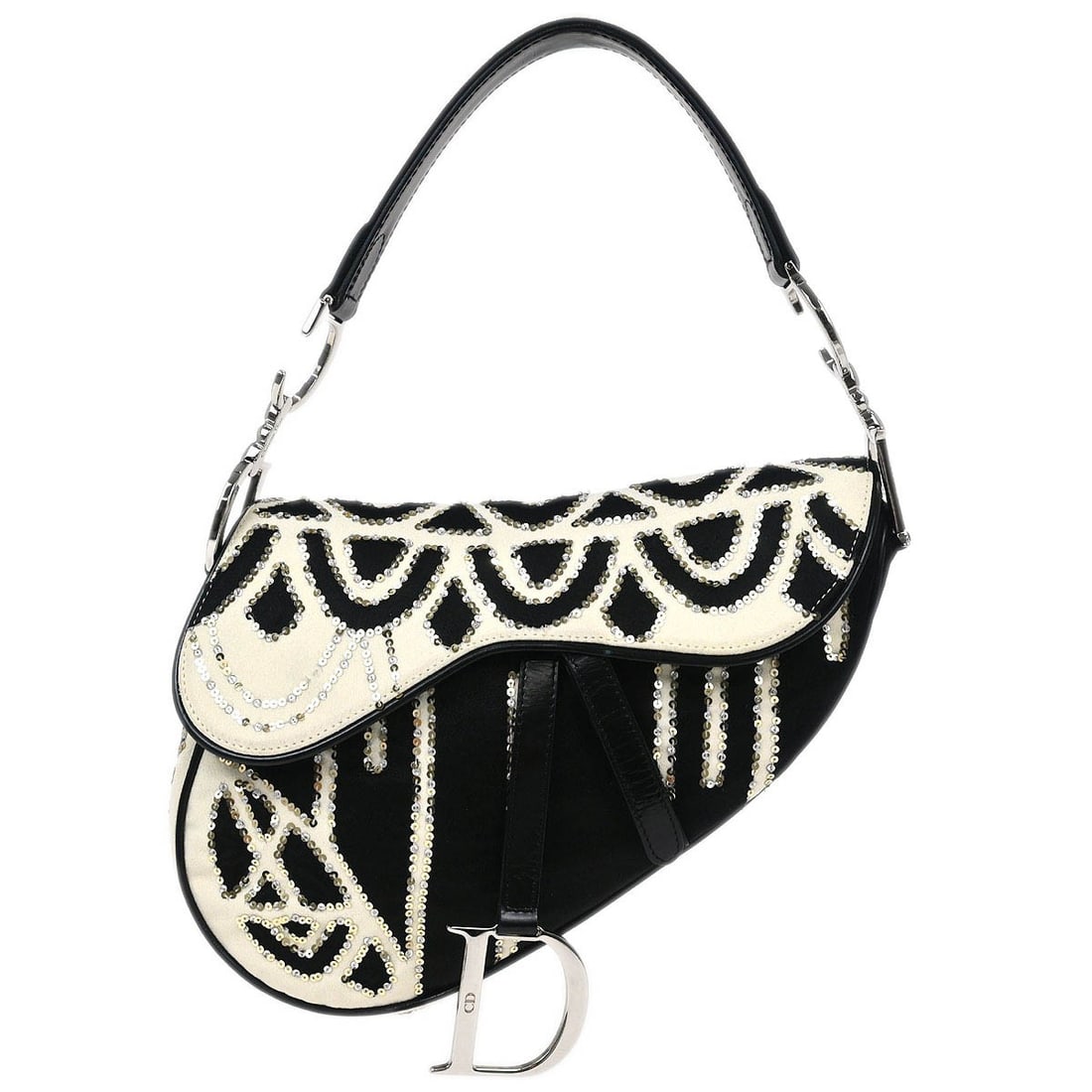 Dior Saddle Medium Top Handle Bag in Black White Satin Sequins: Dior Saddle Medium Top Handle Bag in Black White Satin Sequins Christian Dior Saddle handbag in black and white with a satin, sequins, and leather exterior. This medium top-handle bag features a Velcr