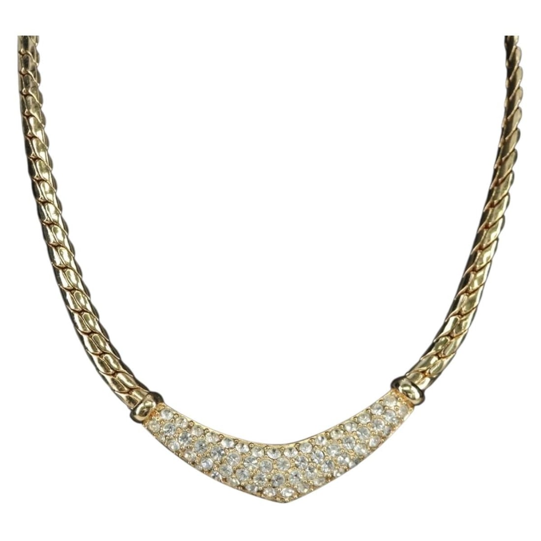 Christian Dior Gold Tone Rhinestone Necklace for Women 17.1 Inch: Christian Dior Gold Tone Rhinestone Necklace for Women 17.1 Inch This authentic Christian Dior necklace features a gold-tone metal design adorned with rhinestones. Crafted in Germany for women, it off