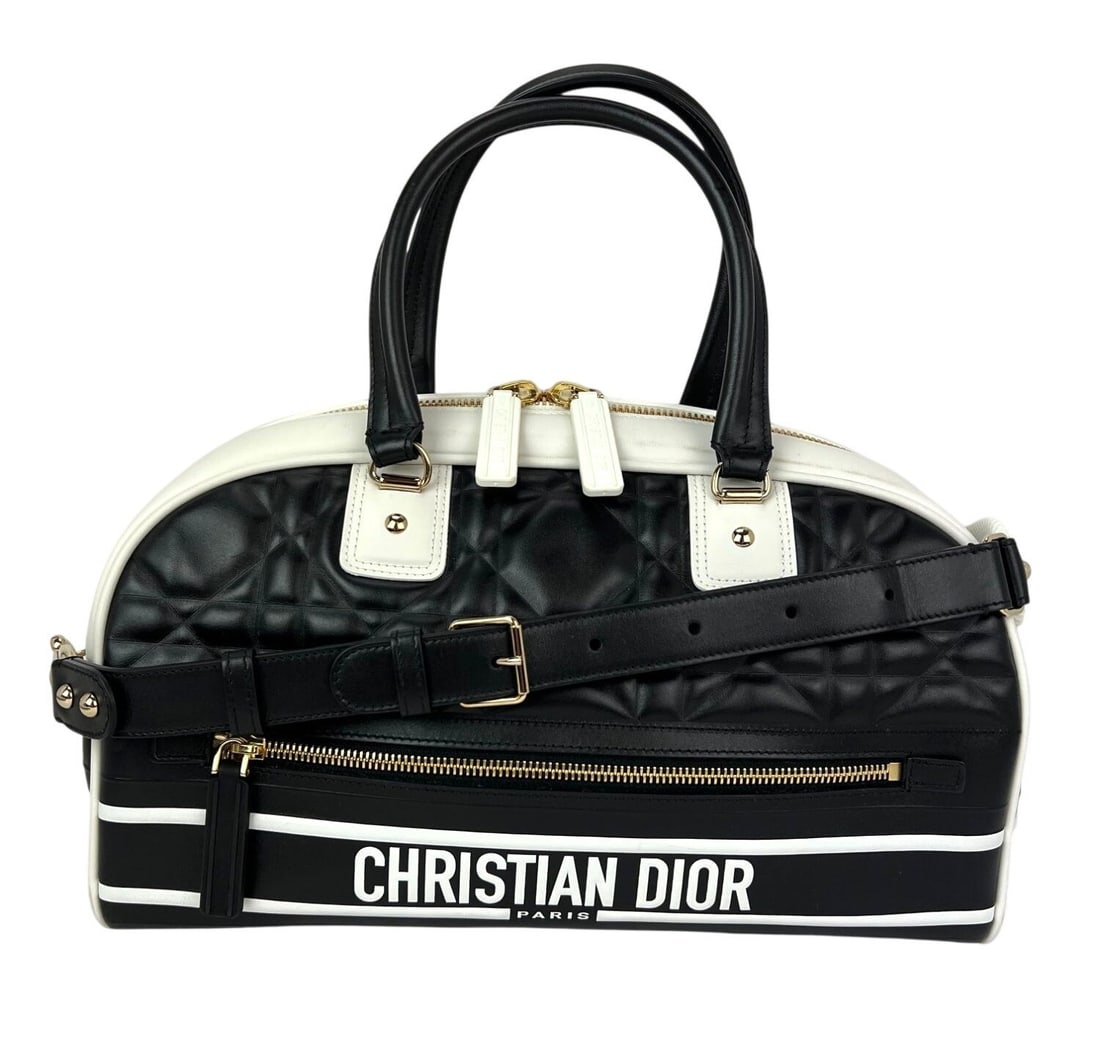 Dior Vibe Medium Quilted Lambskin Bowling Bag Black Cannage with Detachable Strap: Dior Vibe Medium Quilted Lambskin Bowling Bag Black Cannage with Detachable Strap This Christian Dior medium Dior Vibe Zip Bowling Bag features a classic black quilted leather exterior with the iconic
