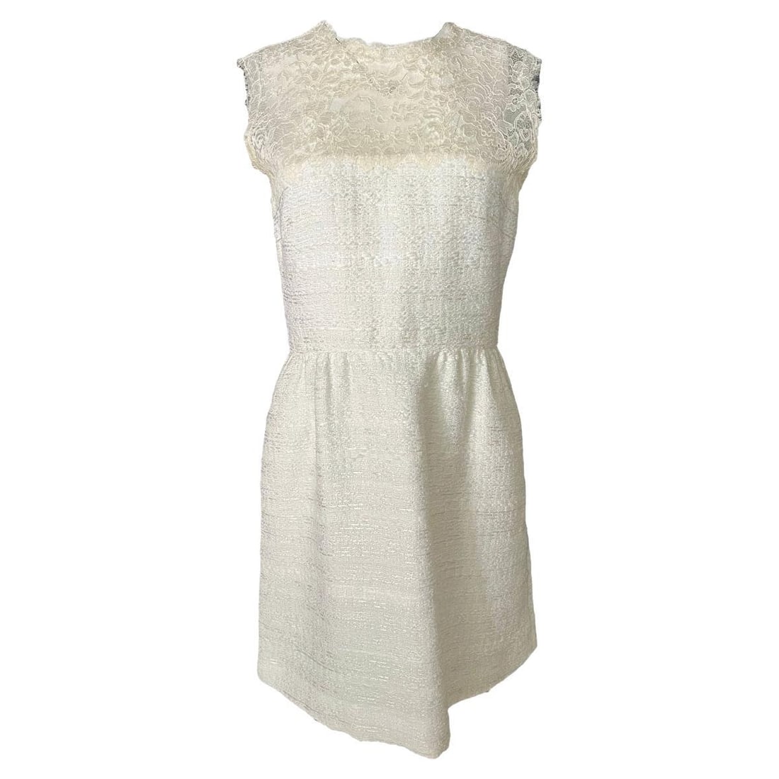 Valentino Size 8 White Sleeveless Lace and Tweed Mini Dress: Valentino Size 8 White Sleeveless Lace and Tweed Mini Dress Valentino white mini dress in size 8, made in Italy and dated to the 21st century. It features a sleeveless design, crew neckline, lace top,